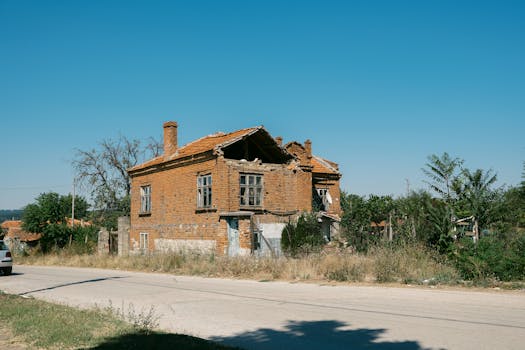 pexels-photo-33690994-33690994 Explore an old brick house in Varna, Bulgaria, set against a vibrant summer sky.